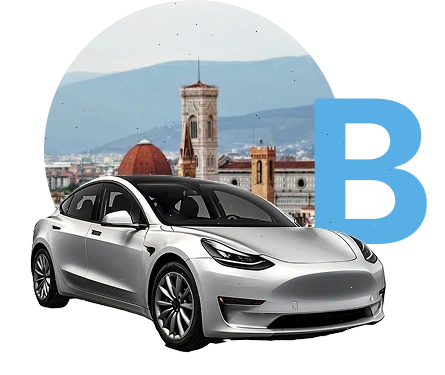 Un'auto argentata, dietro una città e la lettera B